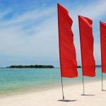 Vlaggen op het strand je ziet ze steeds vaker